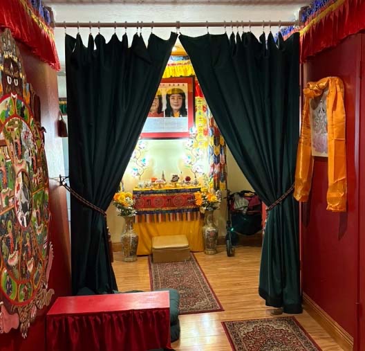 Photos of green curtains that are close off Buddha Hall during sitting meditation at Holy Vajrasana Temple.