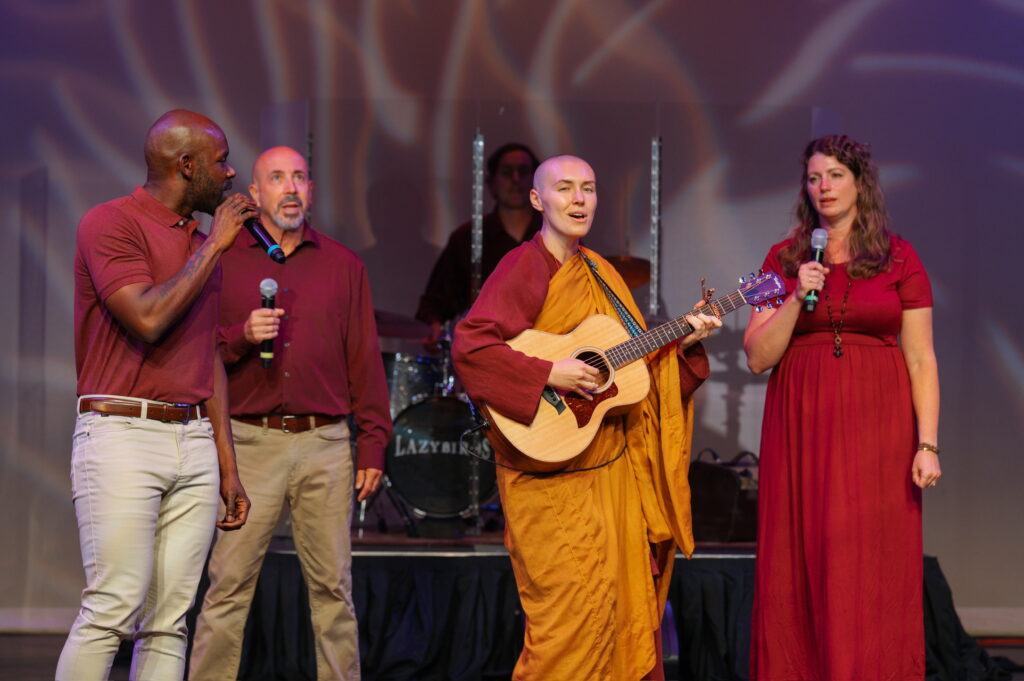 Photo of DharmaVoici Singers performing at Bodhi Fest. 