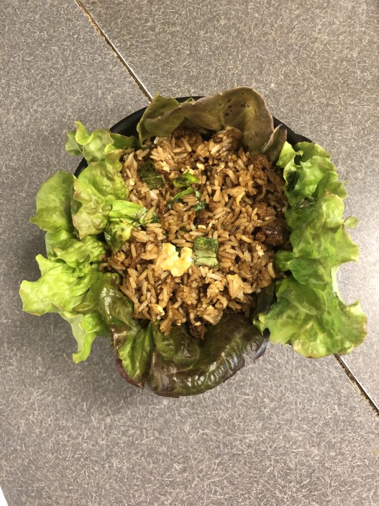 Photo of Tofu with Gochujang Sauce fried with Rice and Egg and served with Lettuce Wrappers.