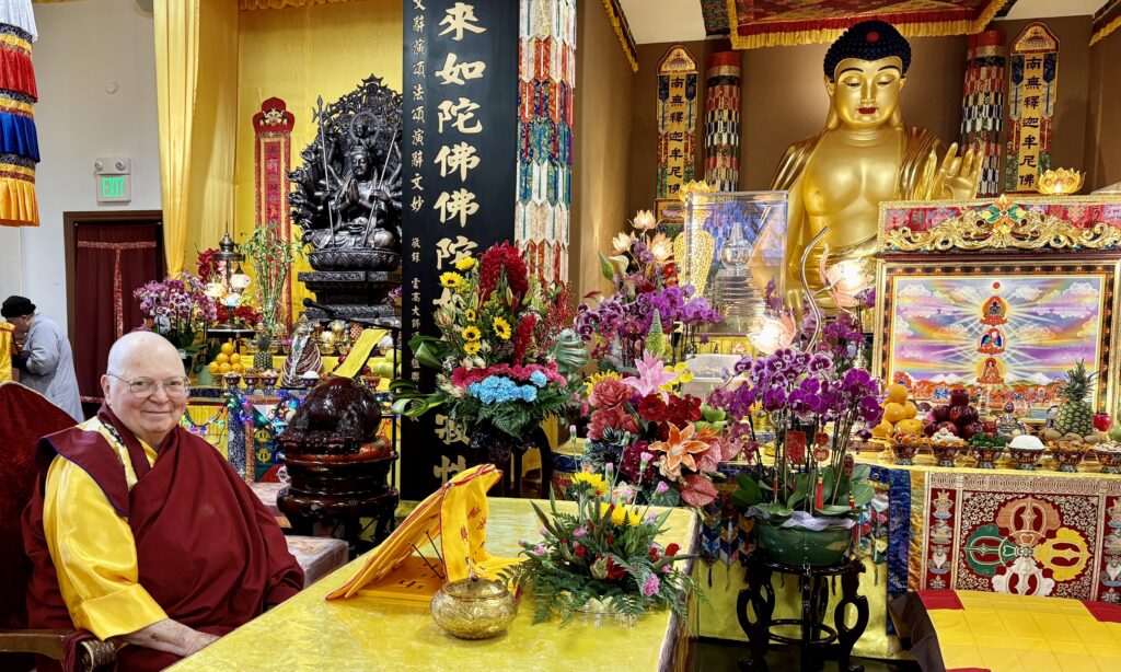 Photo of Shakyamuni Buddha Hall with thousand arm Kuan Yin on left at Hua Zang Si.