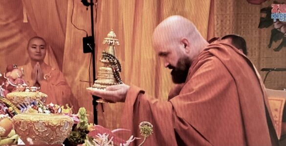 Photo of Holy Guru Mozhi presenting his offering at the 2026 Dharma Assembly honoring the Holy Birthday of Namo Dorje Chang Buddha III.