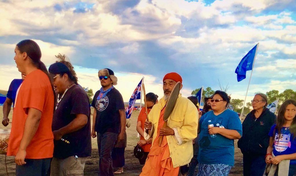 Tibetan monk joins protest.