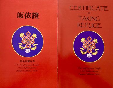 Photo of Refuge Certificate booklet in English and Chinese.