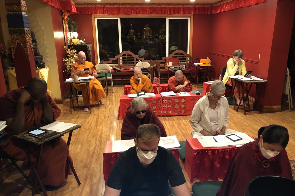 Studying the Heart Sutra at recent retreat at the temple. 
