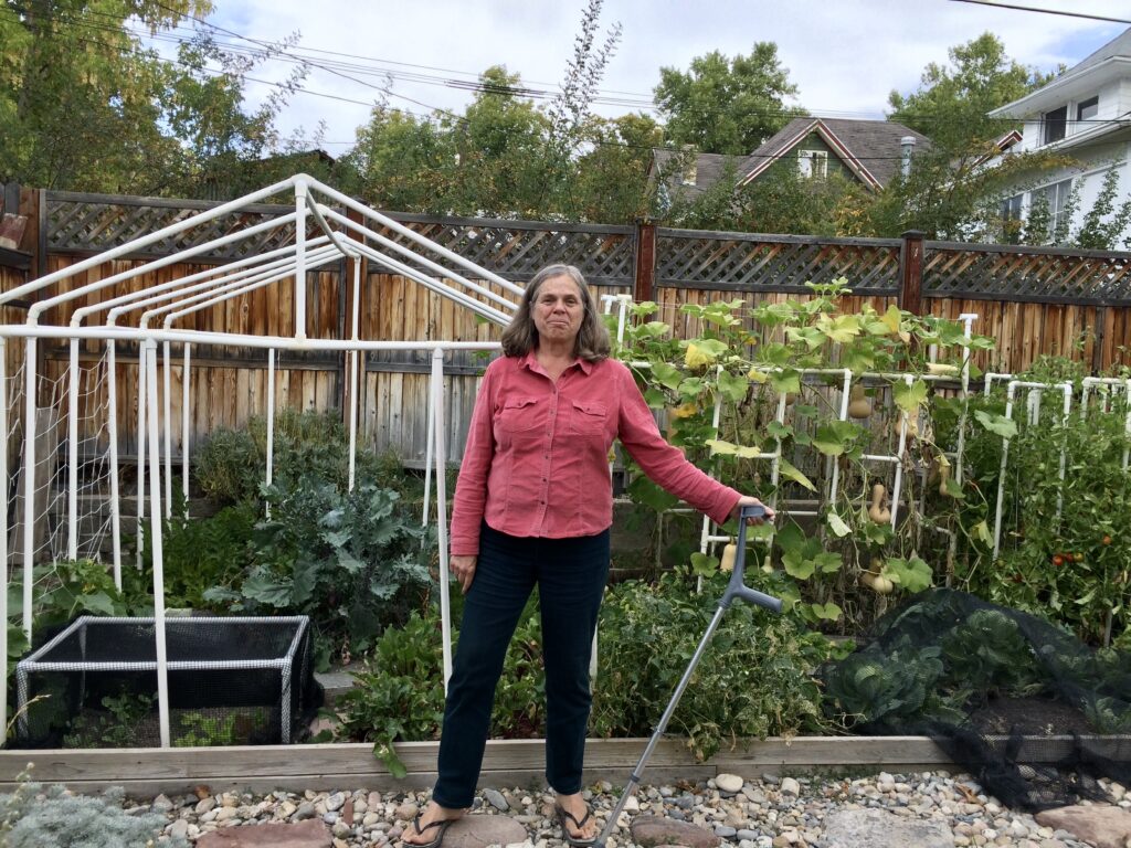 Photo of Gesang Suolang Rinpoche in her garden.