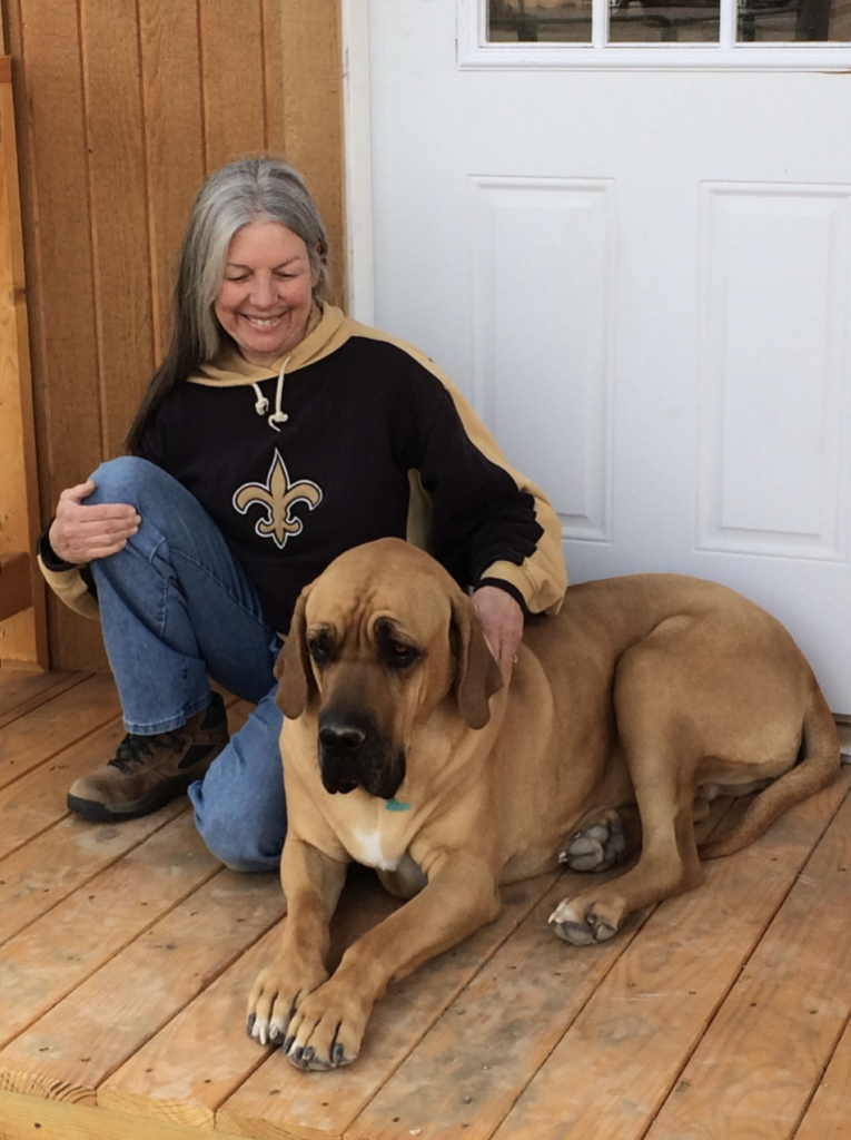 Photo of Deb and Skanda on the porch of the Jones' gompa.