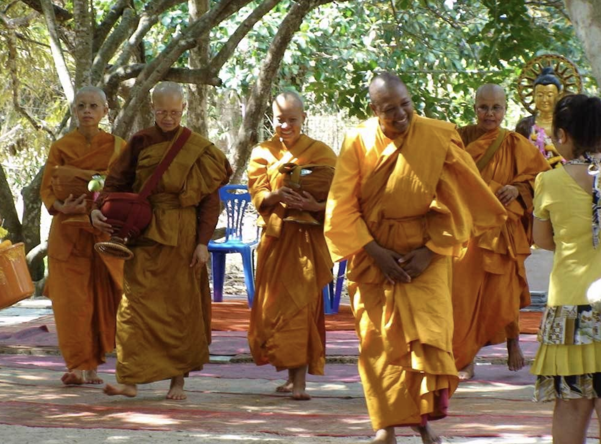 Bhikkhuni Pannavati and others leaving the ordination ceremony.